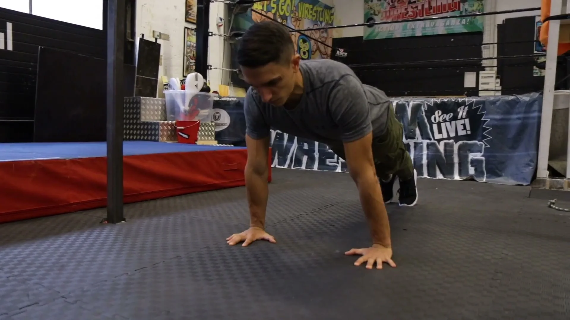 Standard push-up form demonstrating chest, shoulder, and triceps foundation for calisthenics freestyle