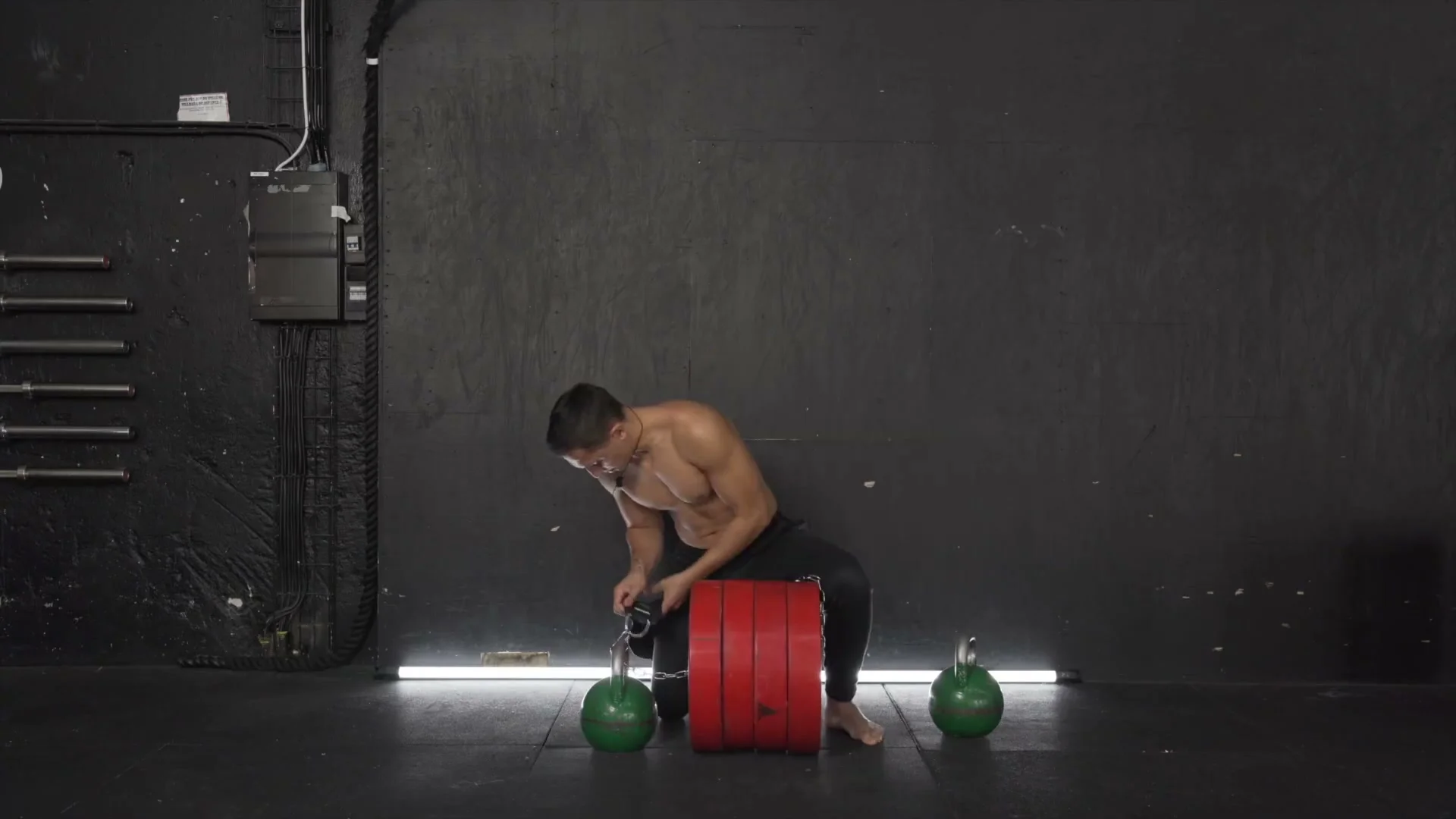 Gornation Dip Belt being tested with approximately 100 kg of weight plates