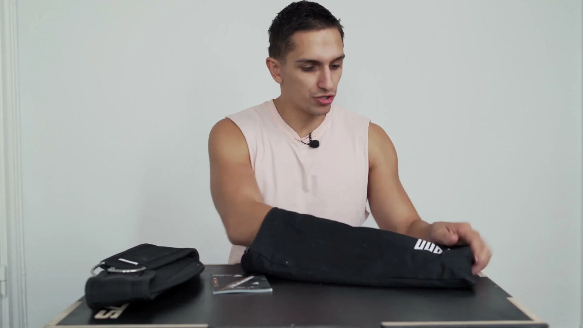 Contents of the Gornation Dip Belt package: belt, chain, carabiners, and storage bag