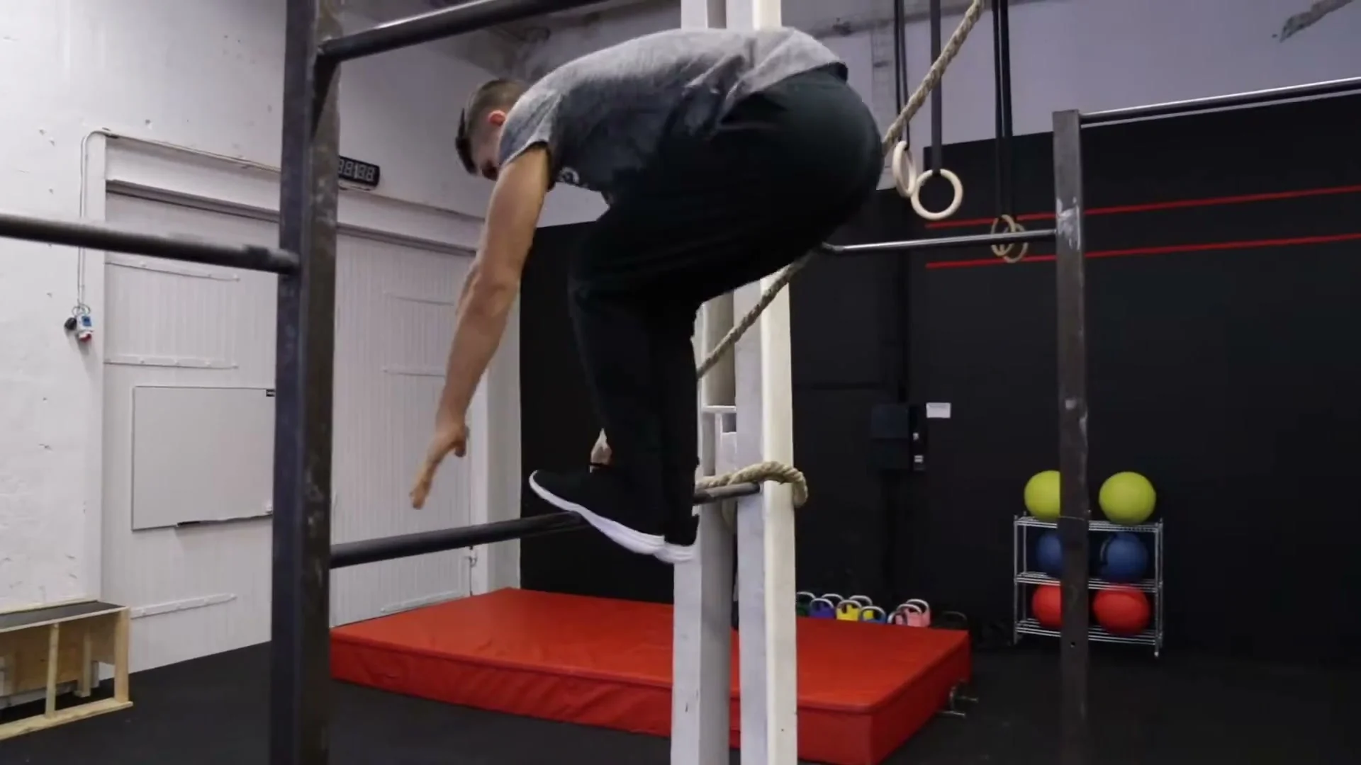 Step 4: both feet landing on the bar at the same time and immediately jumping back down, touching and landing