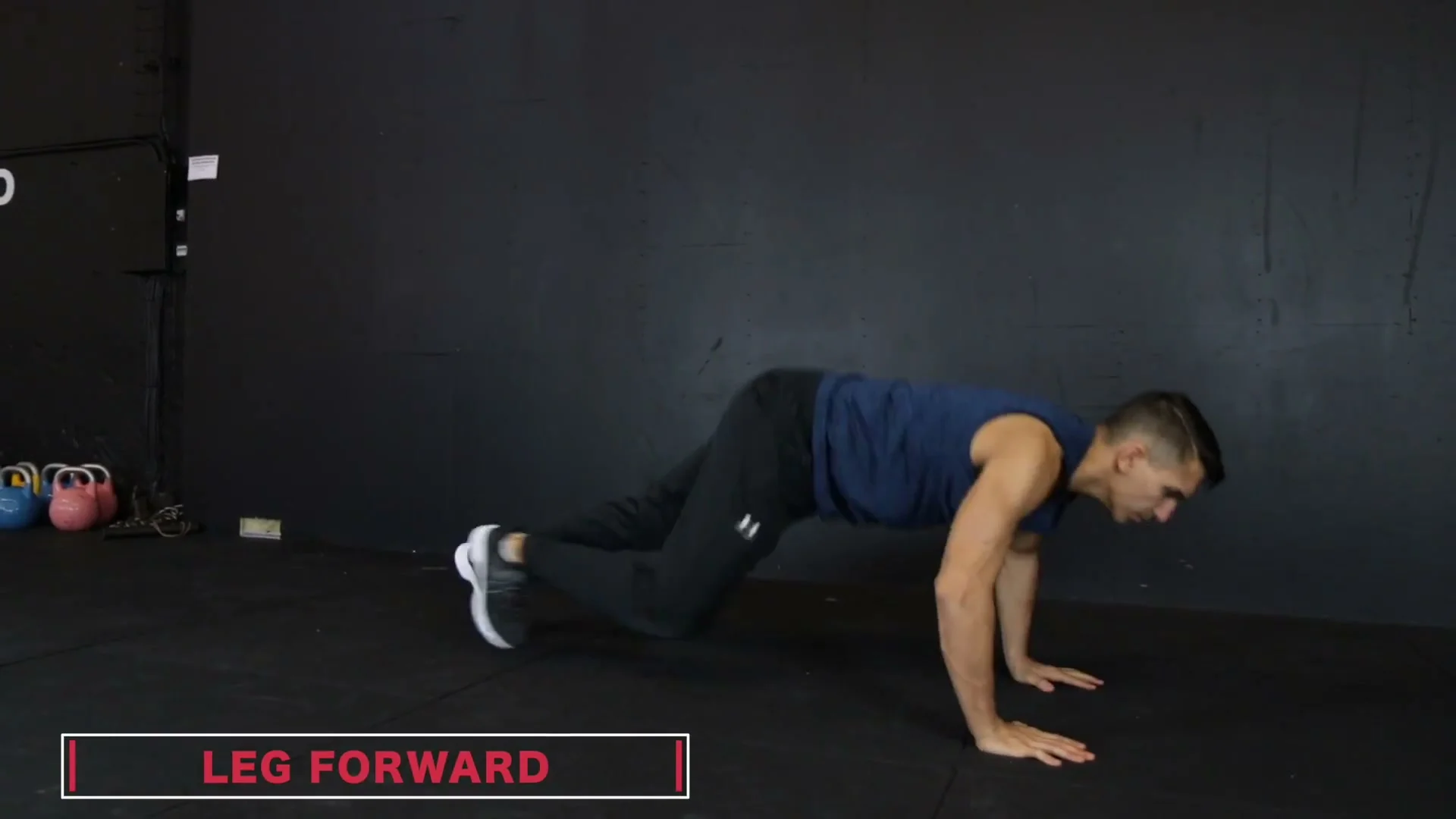 Leg forward method for the push-up 360: one leg brought forward in the push-up position to initiate the spin rotation
