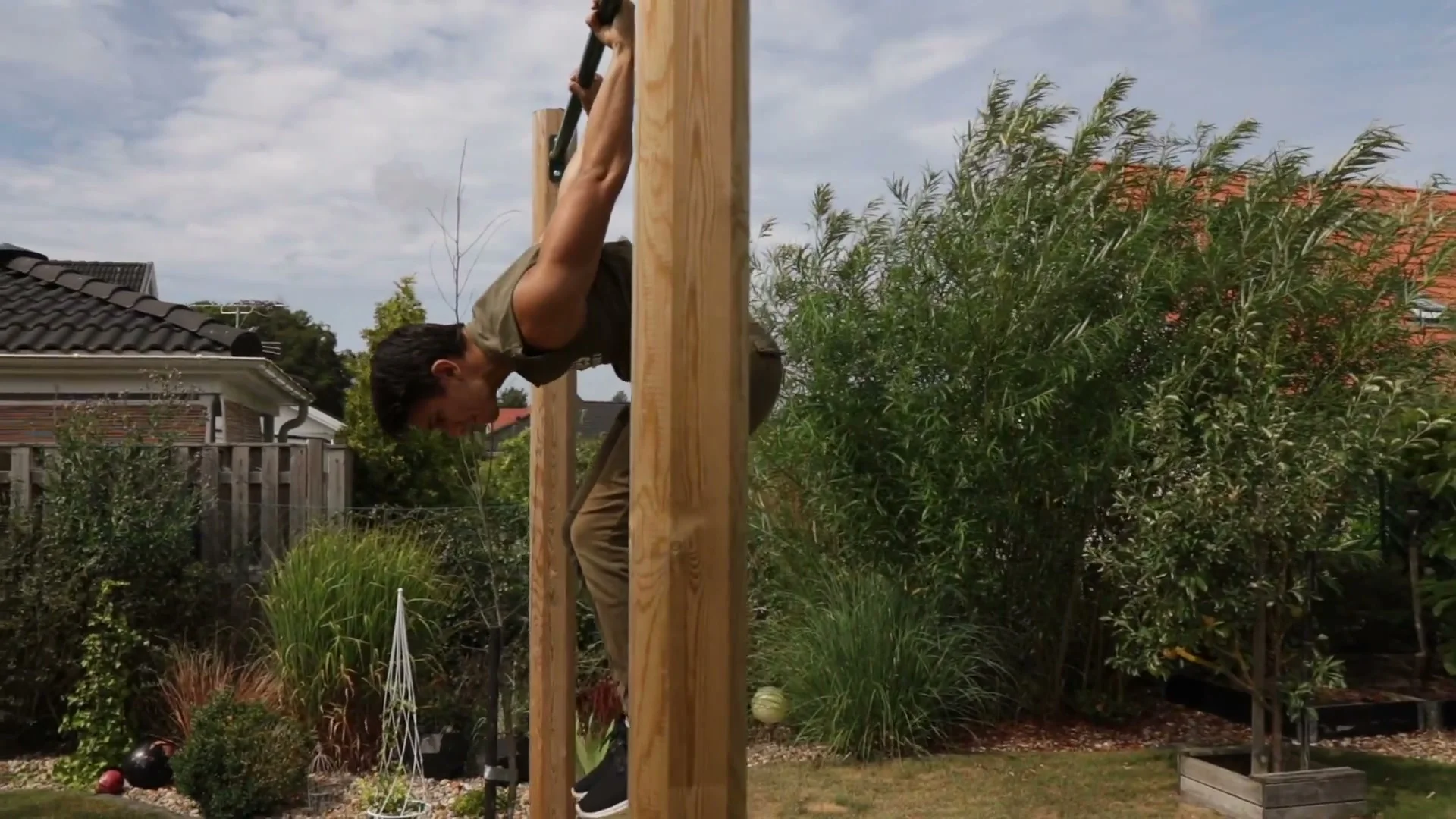 Skin the cat prerequisite for the shrimp flip: inverted tuck hang on the bar, arms straight, passing the bar with legs together