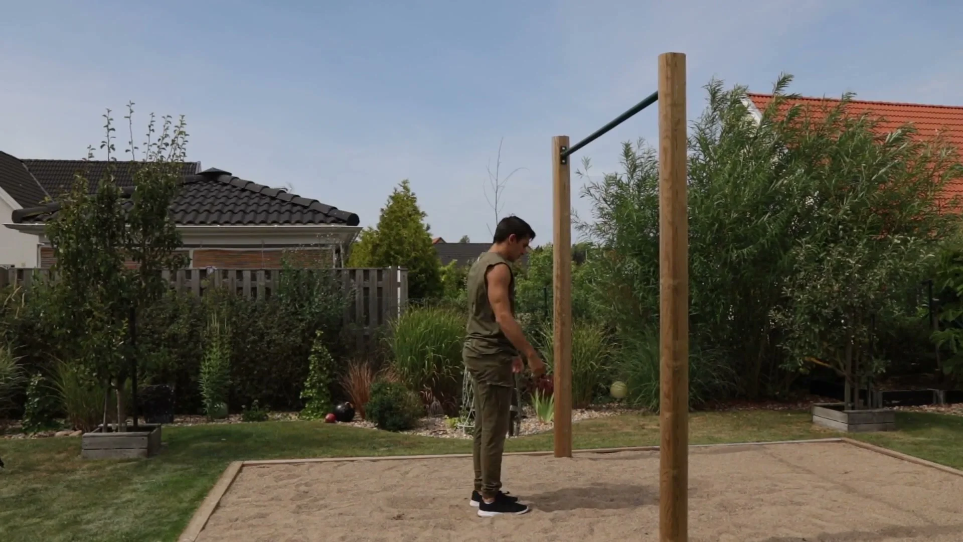 Three-step kick drill starting position for the shrimp flip, standing one step back from the bar ready for the approach