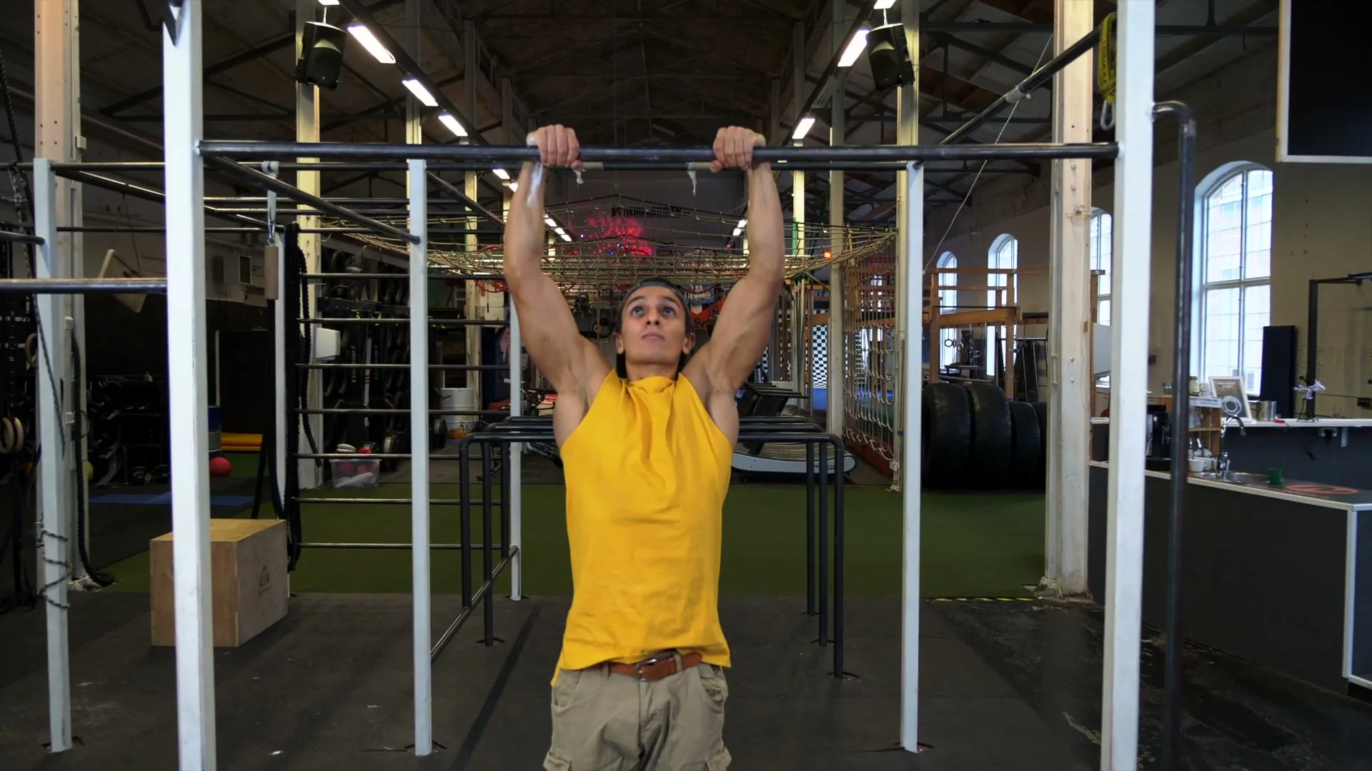 False grip pull-up for slow muscle up: pulling as high as possible with false grip maintained, building the pulling strength for the transition