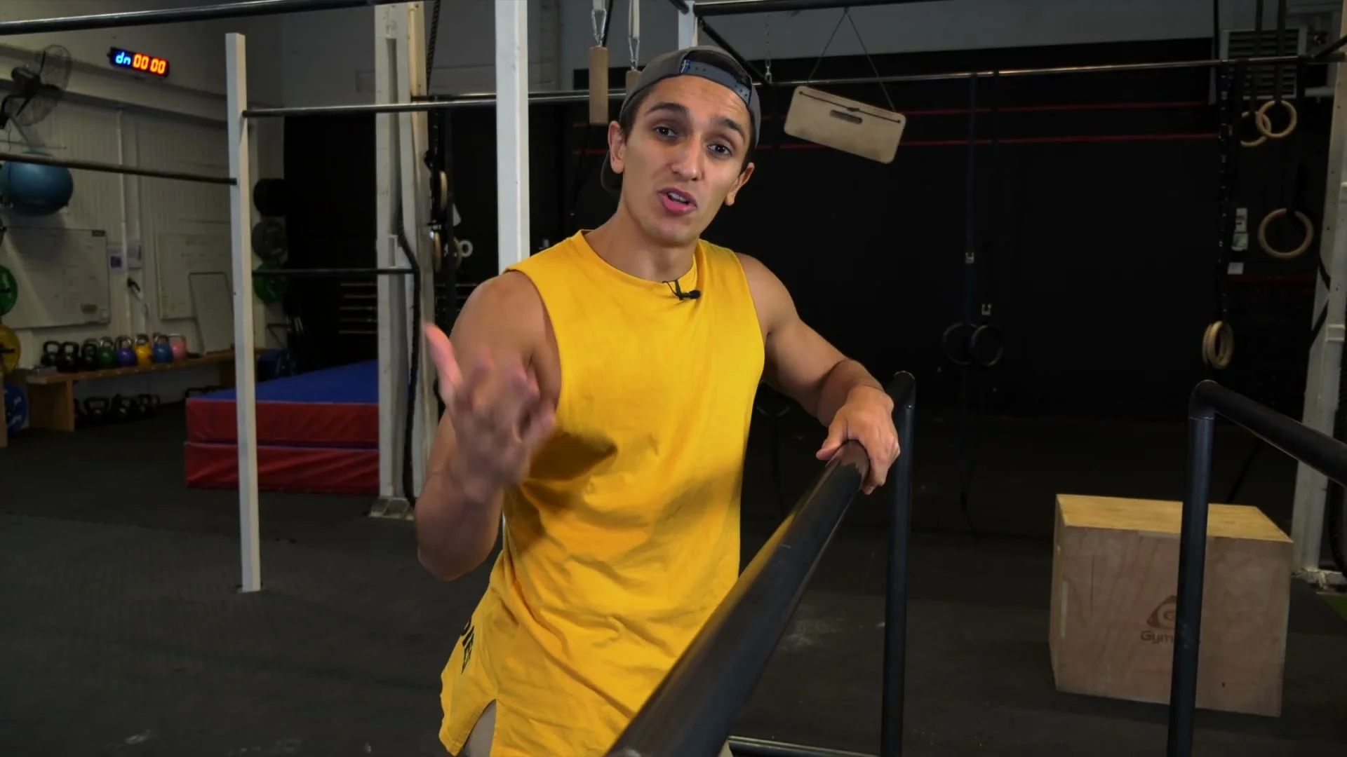 False grip technique for the slow muscle up: hands turned over the bar, wrists on top of bar, the grip position that makes the transition possible